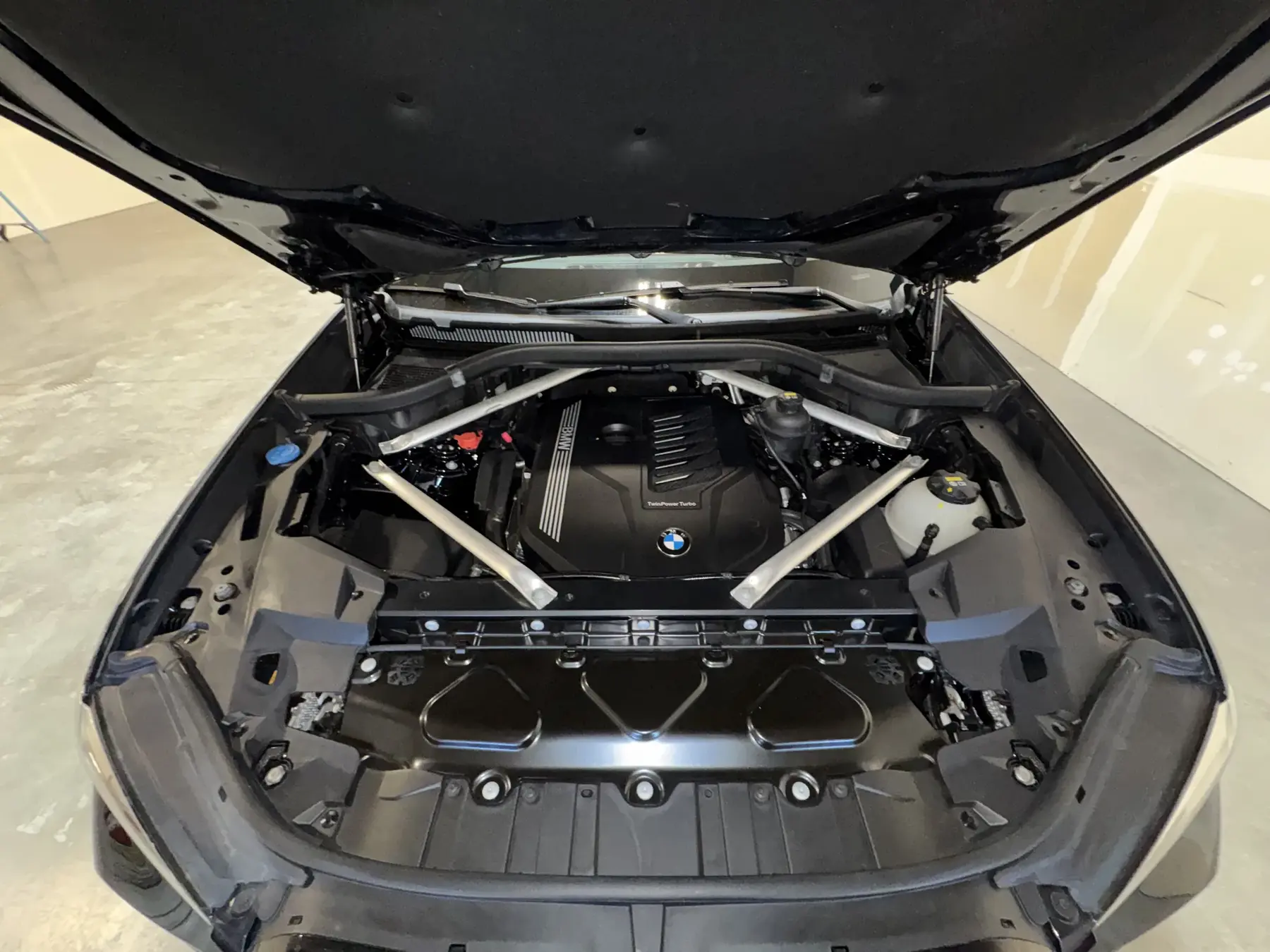 Detailed engine bay on a BMW at Diamond Coating Auto Studio