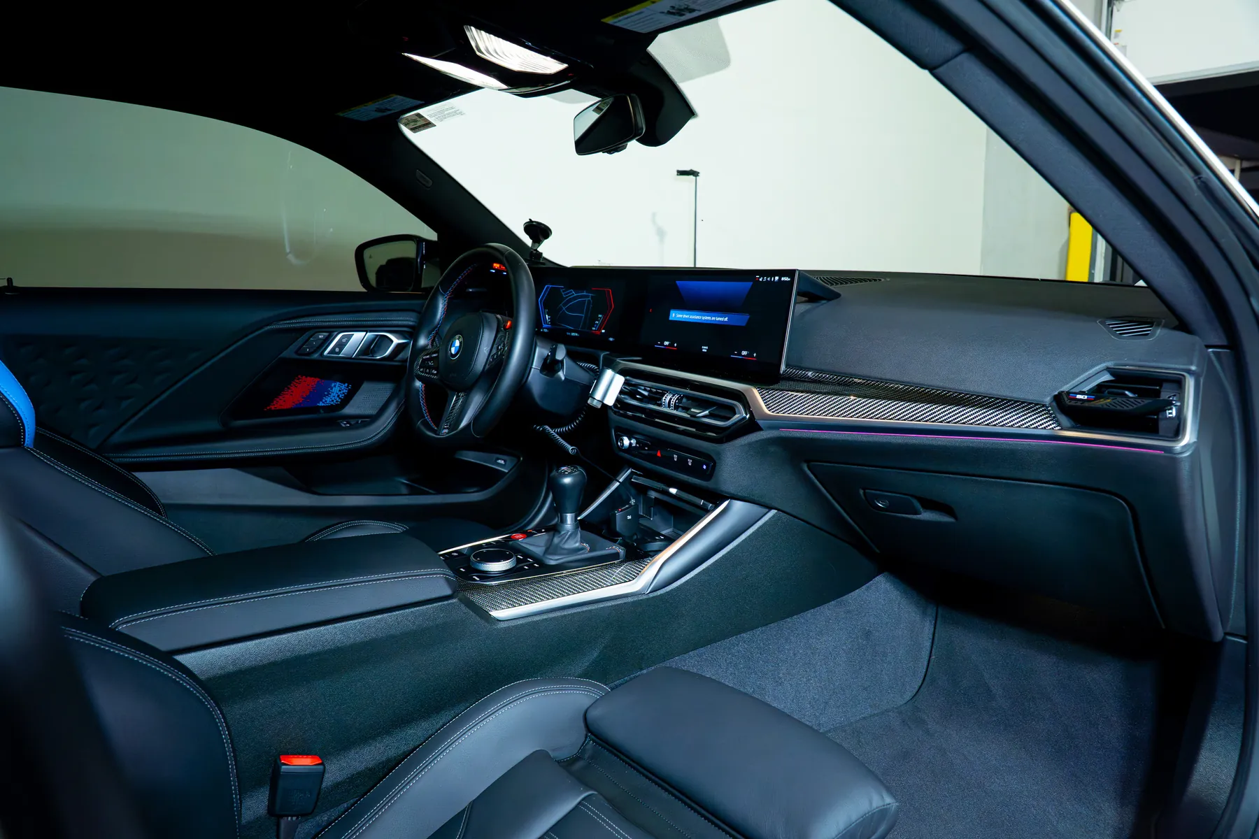 The cleaned cabin and centre console of a BMW M4